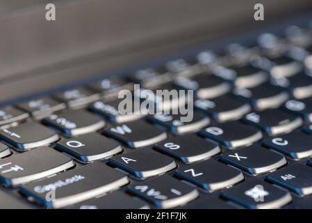Macro shot of laptop with black keyboard Stock Photo