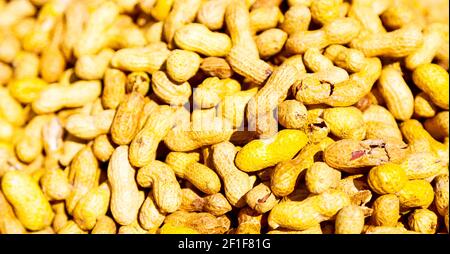In the market lots of peanuts Stock Photo