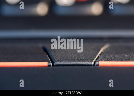 Macro shot of black keyboard focus on touchpad Stock Photo