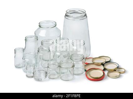 Recycled empty glass jars isolated on white background Stock Photo