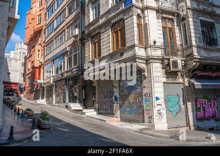 Istanbul architecture. Houses on the hill painted with graffiti. Turkey , Istanbul - 21.07.2020 Stock Photo