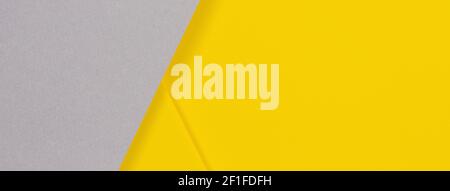 Abstract colored paper texture background. Minimal geometric shapes and lines in yellow and gray colors Stock Photo