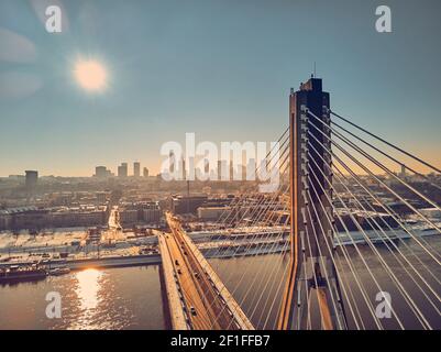 Beautiful panoramic winter aerial drone view to Warsaw city center with skyscrapers and Swietokrzyski Bridge (En: Holy Cross Bridge) - is a cable-stay Stock Photo