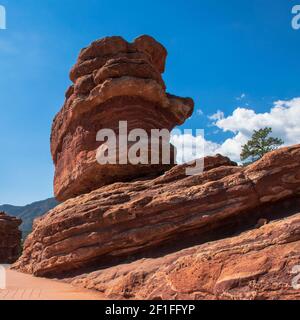 A square format photo taken of a what appears to be precariously balanced rock in the Garden of the Gods. Stock Photo