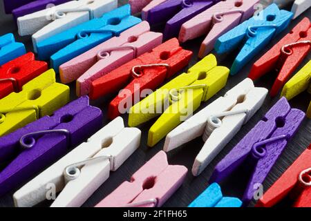 Background from multi-colored clothespins. Diversity and inclusion concept. Stock Photo