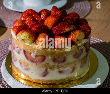 Birthday cake with strawberries and other candies Stock Photo - Alamy