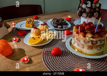 Birthday cake with strawberries and other candies Stock Photo - Alamy