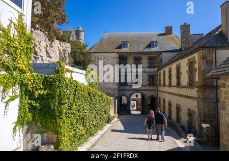 Mont Saint Michel, France - August 29, 2019: Tourists visit to ancient buildings of the Mont Saint Michel Abbey in Lower Normandy , France Stock Photo