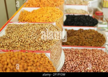Whole grain beans and nuts in boxes. Stock Photo