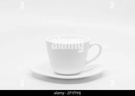 Coffee cup with saucer Isolated on white background Stock Photo