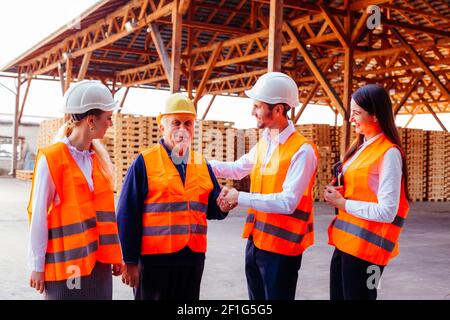 Colleagues are greeting their co-worker with retirement Stock Photo