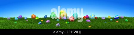Colorful Easter eggs on green grass with blue sky - 3d render Stock Photo