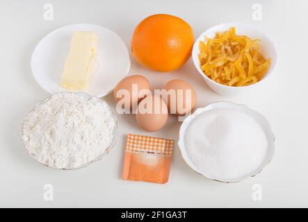 Various ingredients for baking cake. Located on a white background. Stock Photo