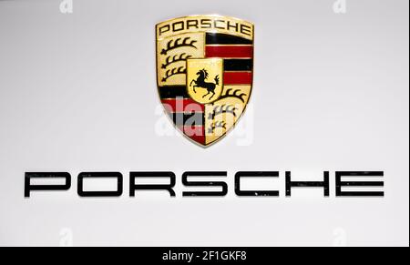 Porsche logo on the wall at the Paris Motor Show. France - October 3, 2018 Stock Photo