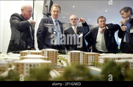 Prime Minister Tony Blair, second left, views a model of the complex during a visit with Deputy PM John Prescott, second right, Monday 24th January, to Grand Union Village in Northolt, West London, as the Government unveils its five-year housing plan. See PA story POLITICS Housing. PRESS ASSOCIATION PHOTOS: Photo credit should read: PA/WPA  Rota/INDEPENDENT/David Sandison Stock Photo
