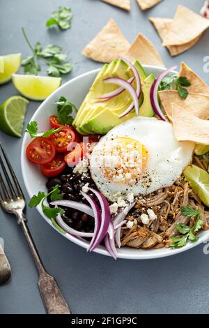 Breakfast burrito bowl with pork carnitas and rice Stock Photo