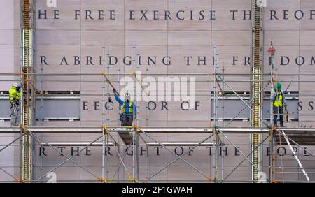 Washington, United States Of America. 04th Mar, 2021. Workers prepare for the removal of the Newseum's iconic First Amendment Tablet facing Pennsylvania Ave. in Washington, DC on March 6, 2021. The 50-ton, 74-foot-tall marble tablet is going into storage, and maybe someday, a new home. Johns Hopkins University acquired the building that once housed the Newseum. (Photo by Jeff Malet) Photo via Credit: Newscom/Alamy Live News