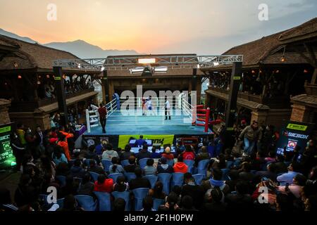 Nepalese woman boxers seen in action during a boxing match marking the International Women's Day celebrations in Kathmandu. Stock Photo