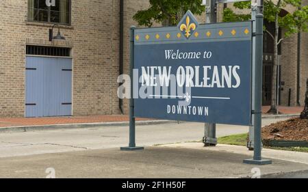 Sidewalk Sign Says Welcome to Downtown New Orleans Stock Photo