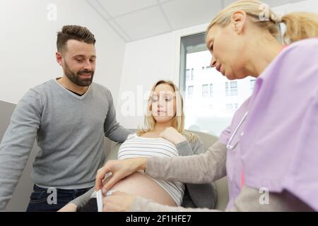 future parent with doctor at the hospital Stock Photo