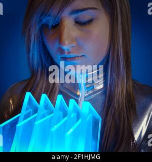 Technology.Fiber Optic concept, woman with modern lights Stock Photo