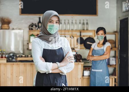 Successful muslim asian small business owner Stock Photo