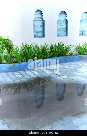 BRICKS SETUP IN WINDOW, WINDOW DESIGN, BRICKS BACKGROUND Stock Photo