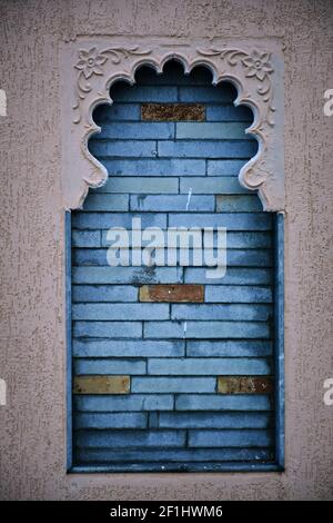 BRICKS SETUP IN WINDOW, WINDOW DESIGN, BRICKS BACKGROUND Stock Photo