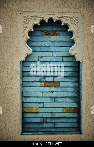 BRICKS SETUP IN WINDOW, WINDOW DESIGN, BRICKS BACKGROUND Stock Photo