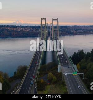 Aerial View Tacoma Narrows Bridges over Puget Sound Mount Rainier in the background Stock Photo