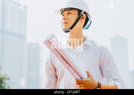 Asian construction engineers are doing experimental tests at the site Stock Photo