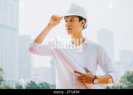 Asian construction engineers are doing experimental tests at the site Stock Photo
