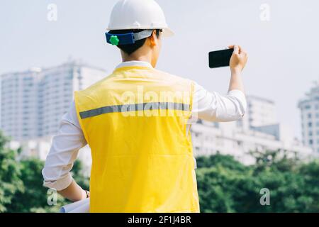 Asian construction engineers are doing experimental tests at the site Stock Photo