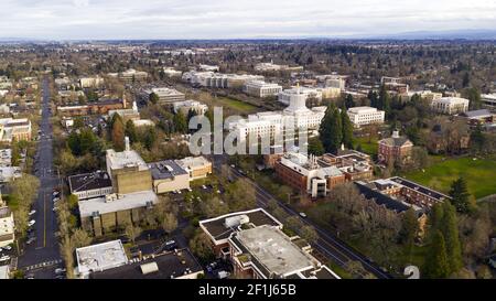 The state capital building adorned with the Oregon Pioneer with Willamette University grounds visable Stock Photo