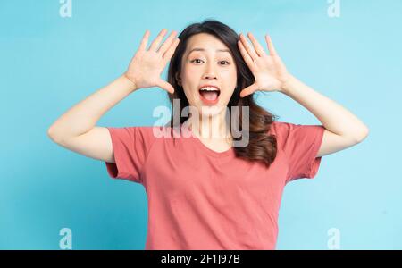 The beautiful Asian woman screamed with joy Stock Photo