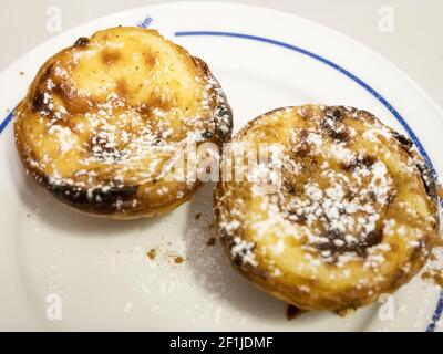 Dish with the famous pasteis de nata, typical dessert of Lisbon, Portugal Stock Photo