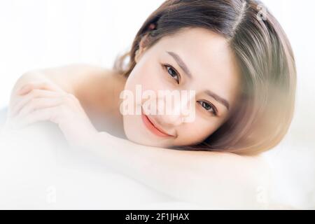 Asian woman going to beauty, skin care in spa Stock Photo