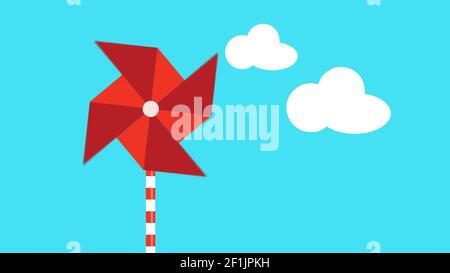 Motion graphic of a red pinwheel that is moved by the wind Stock Photo