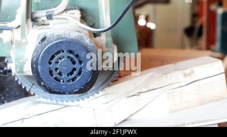 Close up carpenter cutting wooden planks Stock Photo