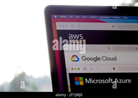 AWS, Google Cloud, and Microsoft Azure logos are seen respectively on the websites of the big three cloud providers on a laptop computer. Stock Photo