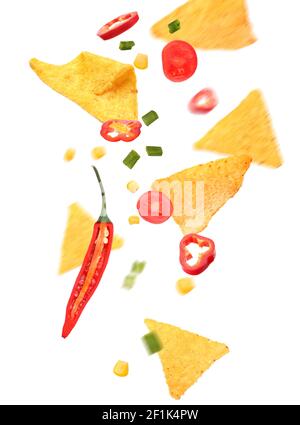 Flying nachos with ingredients on white background Stock Photo