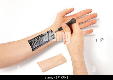 Robot hand inside human hand - Prosthesis concept, repairing, isolated on white Stock Photo