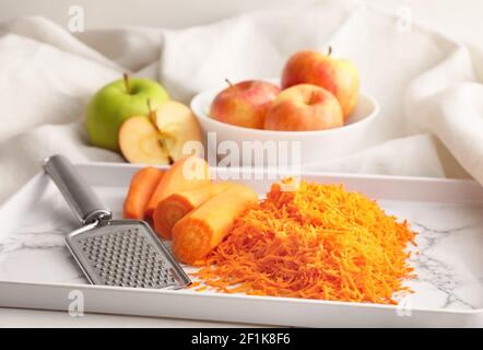 Grater And Fresh Ripe Apple On Wooden Board, Closeup Stock Photo, Picture  and Royalty Free Image. Image 175616454.