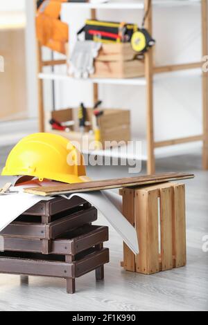 Rack with construction tools in workshop Stock Photo