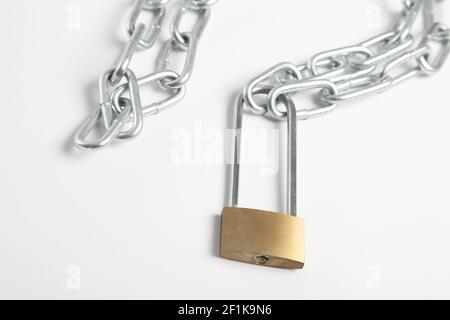 Padlock and chains, on white background Stock Photo