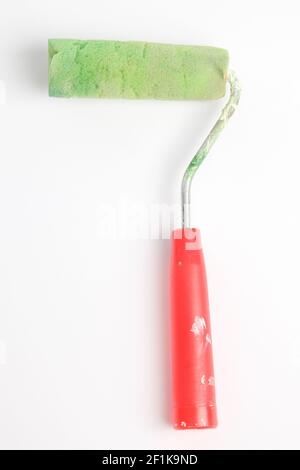 Paint roller in front of a white background Stock Photo