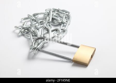 Padlock and chains, on white background Stock Photo