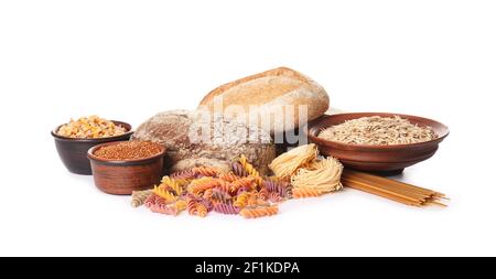 Composition with different cereals, raw pasta and bread on white background Stock Photo