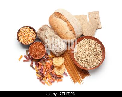 Composition with different cereals, raw pasta and bread on white background Stock Photo