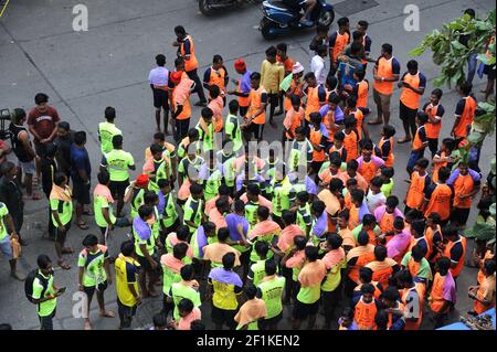 Human Pyramid trying to break dahi handi on Janmashtami, Gokulashtami Govinda Hindu Festival to celebrate Lord Krishna's birthday Stock Photo